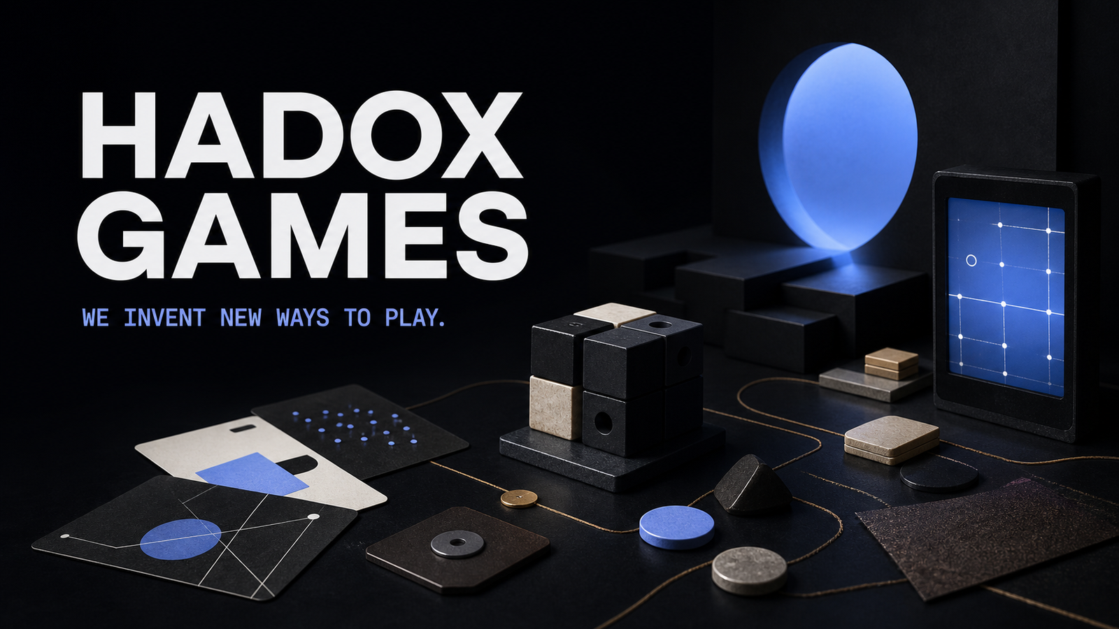 A dark tabletop composition of cards, modular blocks, tokens, a luminous portal and a small game screen